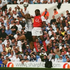 Lauren (arsenal) Freddie Kanoute (Tottenham). Tottenham Hotsour v Arsenal Lauren (arsenal) Freddie Kanoute (Tottenham). Tottenham Hotsour v Arsenal
