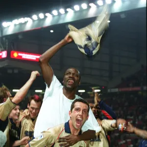 Lauren and Edu celebrate the Arsenal Championship victory after the match