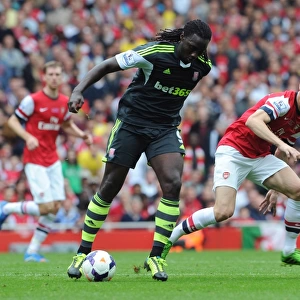 Laurent Koscielny (Arsenal) Kenwyne Jones (Stoke). Arsenal 3: 1 Stoke City. Barclays Premier League