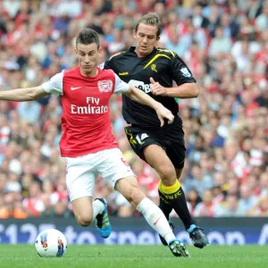 Laurent Koscielny (Arsenal) Kevin Davies (Bolton). Arsenal 3: 0 Bolton Wanderers