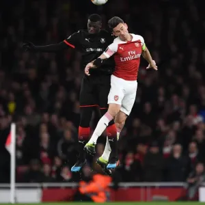 Laurent Koscielny (Arsenal) vs M Baye Niang (Rennes) Print Laurent Koscielny (Arsenal) vs M Baye Niang (Rennes) Print