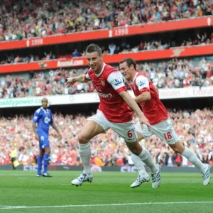 Laurent Koscielny celebrates scoring the 1st Arsenal goal with Sebastien Squillaci