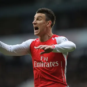 Laurent Koscielny Focused Amidst the Rivalry: Tottenham vs. Arsenal, Premier League 2014-15 Laurent Koscielny Focused Amidst the Rivalry: Tottenham vs. Arsenal, Premier League 2014-15