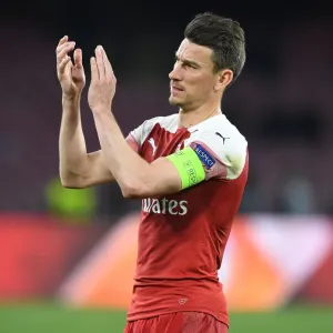 Laurent Koscielny's Farewell Applause: Arsenal's Europa League Battle at Napoli's Stadio San Paolo