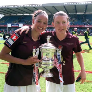 Lianne Sanderson and Kirsty Pealling (Arsenal) with the FA Cup Trophy