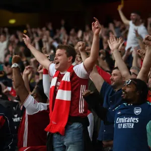 London Derby: Arsenal vs. Tottenham - 2021-22 Premier League Clash: A Sea of Passionate Arsenal Supporters at Emirates Stadium London Derby: Arsenal vs. Tottenham - 2021-22 Premier League Clash: A Sea of Passionate Arsenal Supporters at Emirates Stadium