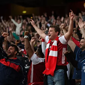 London Derby: Arsenal vs. Tottenham - 2021-22 Premier League Clash: A Sea of Passionate Arsenal Supporters at Emirates Stadium
