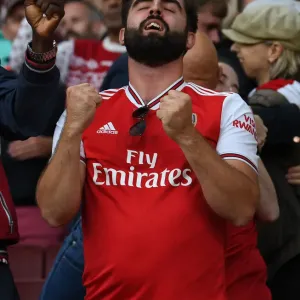 London Derby: Arsenal vs. Tottenham - Passionate Arsenal Fan at Emirates Stadium, Premier League 2021-22 London Derby: Arsenal vs. Tottenham - Passionate Arsenal Fan at Emirates Stadium, Premier League 2021-22
