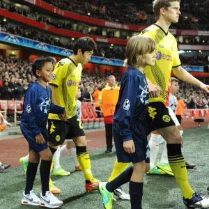 LONDON, ENGLAND - NOVEMBER 23: Player escorts before the UEFA Champions League Group F match between Arsenal FC and Borussia Dortmund at Emirates Stadium on November 23, 2011 in London, England. (Photo by David Price / Arsenal FC via