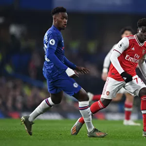 London Rivals Clash: Saka vs. Hudson-Odoi - Premier League Showdown at Stamford Bridge