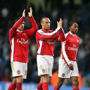 Print of Arsenal players applauding fans after a match