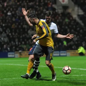Lucas Perez (Arsenal) back heels the ball for Olivier Guirouds goal under pressure