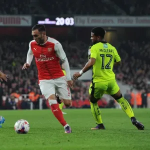 Lucas Perez (Arsenal) Joey van den Berg and Garath McCleary (Reading). Arsenal 2