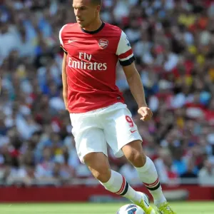 Lukas Podolski: In Action for Arsenal vs Sunderland, Premier League 2012-13 Lukas Podolski: In Action for Arsenal vs Sunderland, Premier League 2012-13
