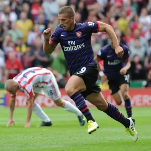 Lukas Podolski in Action: Stoke City vs. Arsenal, Premier League 2012-13 Lukas Podolski in Action: Stoke City vs. Arsenal, Premier League 2012-13