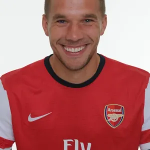Lukas Podolski at Arsenal 2013-14 Squad Team Photocall Lukas Podolski at Arsenal 2013-14 Squad Team Photocall