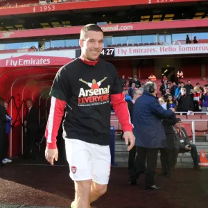 Lukas Podolski (Arsenal) in his Arsenal for Everyone T Shirt. Arsenal 4: 1 Sunderland