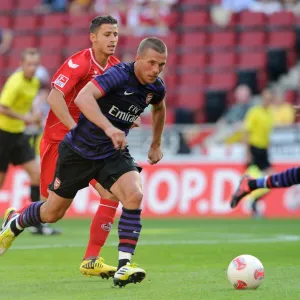 Lukas Podolski (Arsenal) Dino Bisanovic (Cologne). Cologne 0: 4 Arsenal