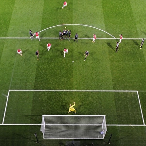 Lukas Podolski (Arsenal) free kick hits the Liverpool wall. Arsenal 2: 2 Liverpool