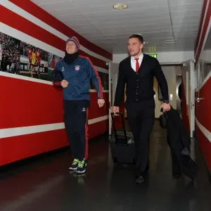 Lukas Podolski and Bastian Schweinsteiger: A Football Rivalry Turned Camaraderie at Arsenal v Bayern Munich, 2014 Lukas Podolski and Bastian Schweinsteiger: A Football Rivalry Turned Camaraderie at Arsenal v Bayern Munich, 2014