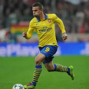 Lukas Podolski: Battle in Munich - Arsenal vs. FC Bayern Munich, UEFA Champions League 2014 Lukas Podolski: Battle in Munich - Arsenal vs. FC Bayern Munich, UEFA Champions League 2014
