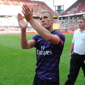 Lukas Podolski Bids Farewell: Arsenal Star Waves to Cologne Fans after Pre-Season Friendly
