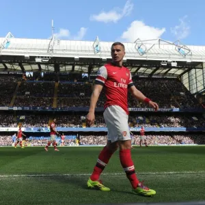 Lukas Podolski Faces Off Against Chelsea: Premier League Showdown (2013-14) Lukas Podolski Faces Off Against Chelsea: Premier League Showdown (2013-14)
