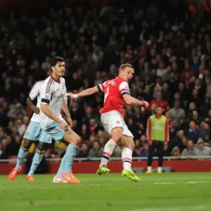 Lukas Podolski Scores Dramatic Goal Past James Tomkins and Adrian in Arsenal's Victory over West Ham United Lukas Podolski Scores Dramatic Goal Past James Tomkins and Adrian in Arsenal's Victory over West Ham United