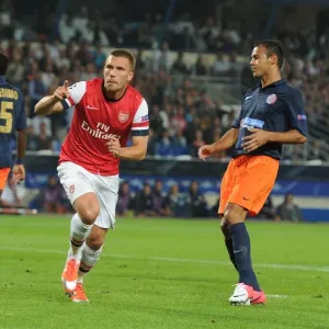 Lukas Podolski Scores First Arsenal Goal in Montpellier Victory, 2012-13 UEFA Champions League Lukas Podolski Scores First Arsenal Goal in Montpellier Victory, 2012-13 UEFA Champions League