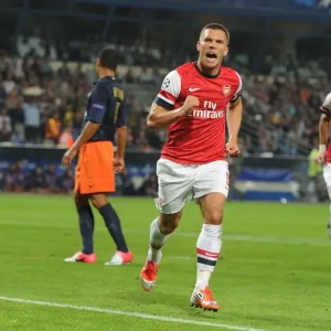 Lukas Podolski Scores First Arsenal Goal in UEFA Champions League Victory over Montpellier (September 2012) Lukas Podolski Scores First Arsenal Goal in UEFA Champions League Victory over Montpellier (September 2012)