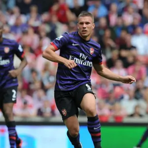 Lukas Podolski: Starring in Arsenal's Battle Against Stoke City, Premier League 2012-13 Lukas Podolski: Starring in Arsenal's Battle Against Stoke City, Premier League 2012-13