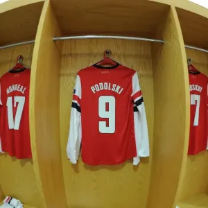 Lukas Podolski's Arsenal Jersey on Display: Arsenal FC vs. FC Bayern Munchen, UEFA Champions League Round of 16 Lukas Podolski's Arsenal Jersey on Display: Arsenal FC vs. FC Bayern Munchen, UEFA Champions League Round of 16