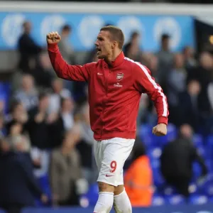 Lukas Podolski's Celebration: Arsenal's Victory Over Tottenham Hotspur in the Premier League, 2014 Lukas Podolski's Celebration: Arsenal's Victory Over Tottenham Hotspur in the Premier League, 2014