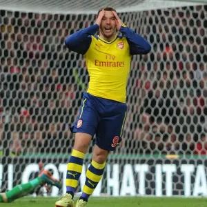Lukas Podolski's Missed Opportunity: Stoke City vs. Arsenal, Premier League, 2014 Lukas Podolski's Missed Opportunity: Stoke City vs. Arsenal, Premier League, 2014