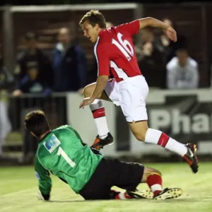 Luke Freeman scores Arsenals 6th goal past Chris Tardiff (Maidenhead)