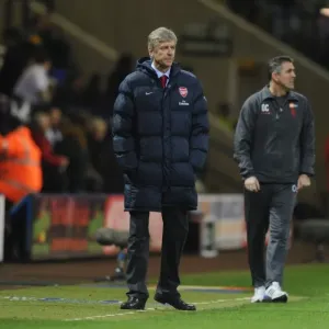 Managers : Arsene Wenger (Arsenal) and Owen Coyle (Bolton) during the match