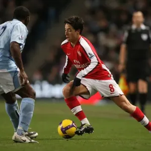 Manchester City's Double Strike: Nasri vs. Vassell in the 3:0 Rout of Arsenal