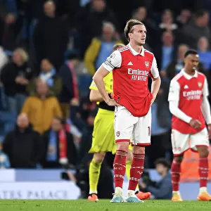 Manchester City's Haaland Holds Reign: Arsenal's Holding Disappointed After Fourth Goal