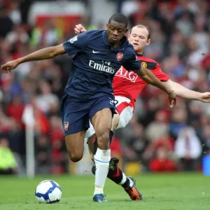 Manchester United Edge Past Arsenal: Diaby vs. Rooney in a Tight 2:1 Battle Manchester United Edge Past Arsenal: Diaby vs. Rooney in a Tight 2:1 Battle