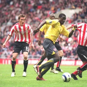 Manu Eboue (Arsenal) George McCartney (Sunderland)