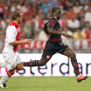 Manu Eboue (Arsenal) Wesley Sneijder (Ajax) Manu Eboue (Arsenal) Wesley Sneijder (Ajax)