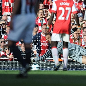 Manuel Almunia (Arsenal) saves the West Brom penalty taken by Chris Brunt