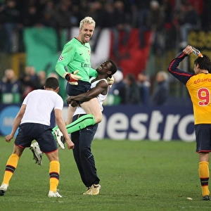 Manuel Almunia and Arsenal Team Celebrate Hard-Fought Victory Over AS Roma in UEFA Champions League