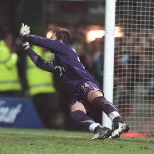 Manuel Almunia saves Doncasters 4th penalty during the penalty shoot out