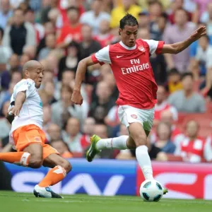Marouane Chamakh (Arsenal) Alex Baptiste (Blackpool). Arsenal 6: 0 Blackpool Marouane Chamakh (Arsenal) Alex Baptiste (Blackpool). Arsenal 6: 0 Blackpool