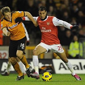 Marouane Chamakh (Arsenal) Christophe Berra (Wolves). Wolverhampton Wanderers 0: 2 Arsenal