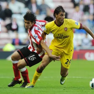 Marouane Chamakh Print (Arsenal) vs Cristian Riveros Print (Sunderland) Marouane Chamakh Print (Arsenal) vs Cristian Riveros Print (Sunderland)