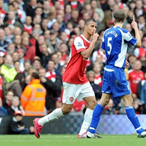 Marouane Chamakh (Arsenal) Roger Johnson (Birmingham). Arsenal 2: 1 Birmingham City