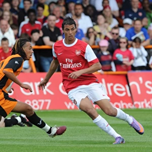 Marouane Chamakh (Arsenal) Sam Cox (Barnet). Barnet 0: 4 Arsenal, Pre season friendly