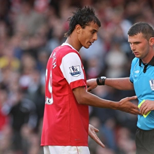 Marouane Chamakh (Arsenal) talks to Referee Michael Oliver. Arsenal 2: 3 West Bromwich Albion